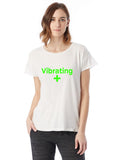 Vibrating + green on white t-shirt