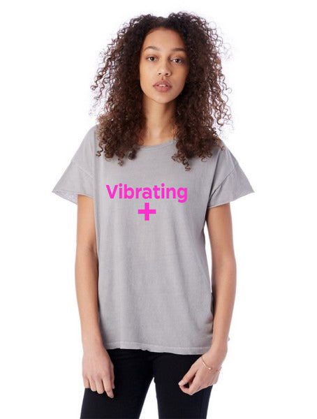 Vibrating + pink on gray t-shirt
